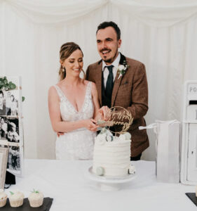 Bride and Groom cutting the cake at Hilltop Country House.