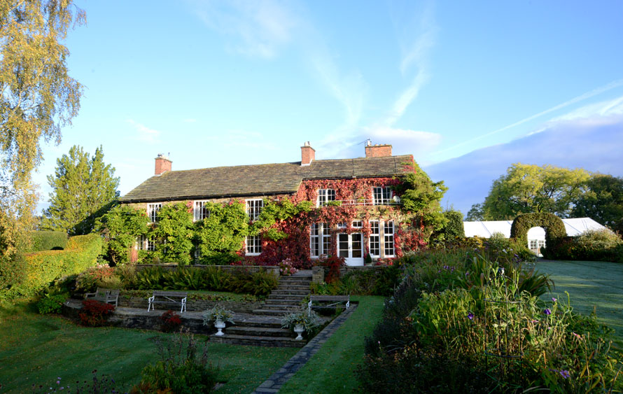 The exterior of Hilltop Country House in the autumn.